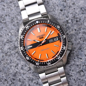 Seiko SRPK11K1 5 Sports Double Hurricane Retro Orange Dial Silver Steel Strap Watch For Men Seiko